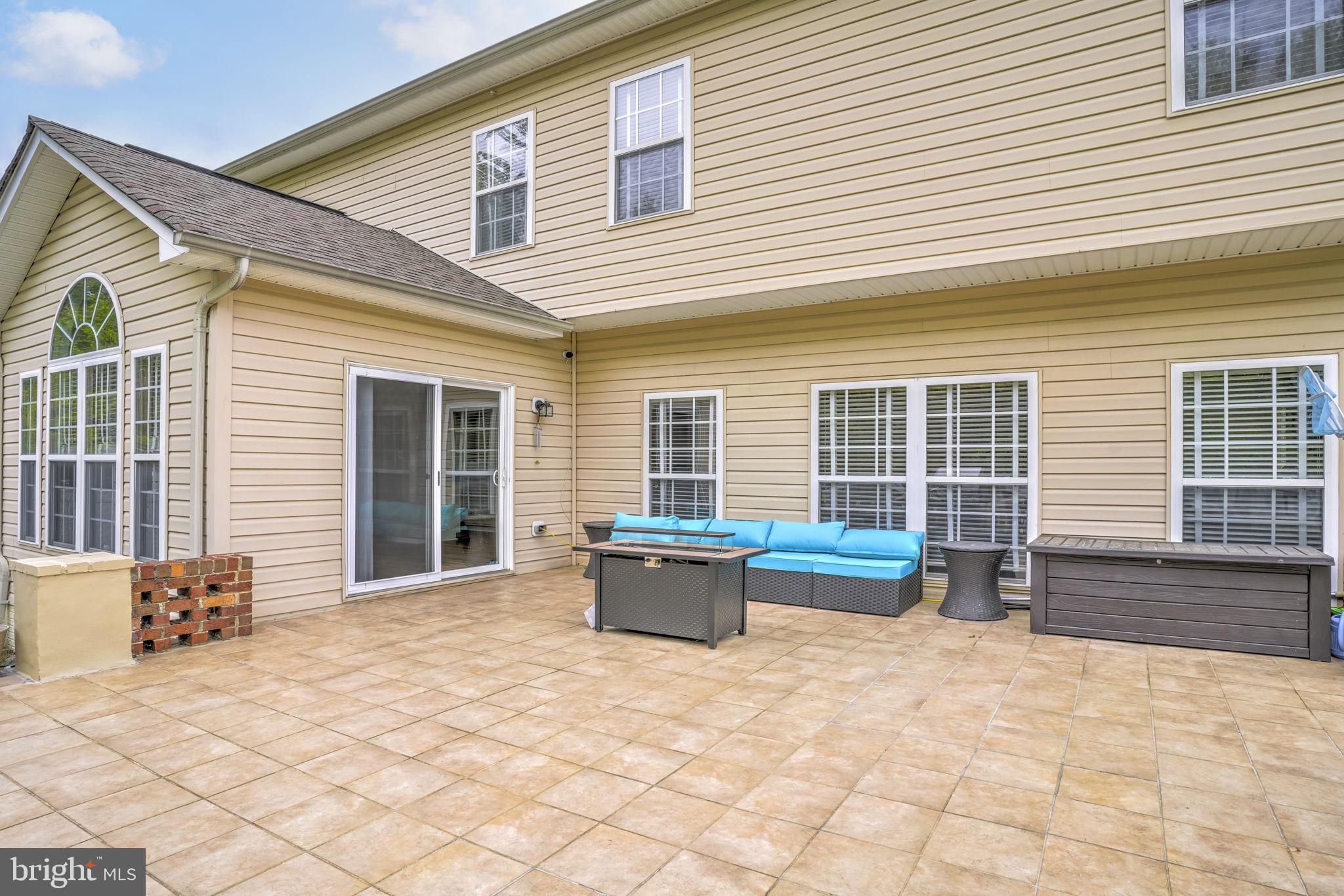 1507 St Albans Lane Accokeek, MD 20607 - Photo 5 of 36 a front view of a house with outdoor seating