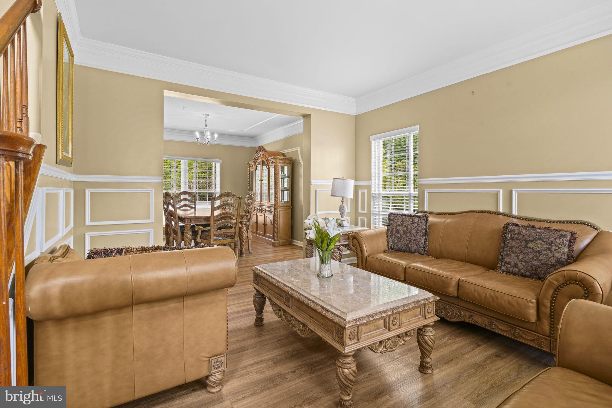 1507 St Albans Lane Accokeek, MD 20607 - Photo 10 of 36 a living room with furniture and a table