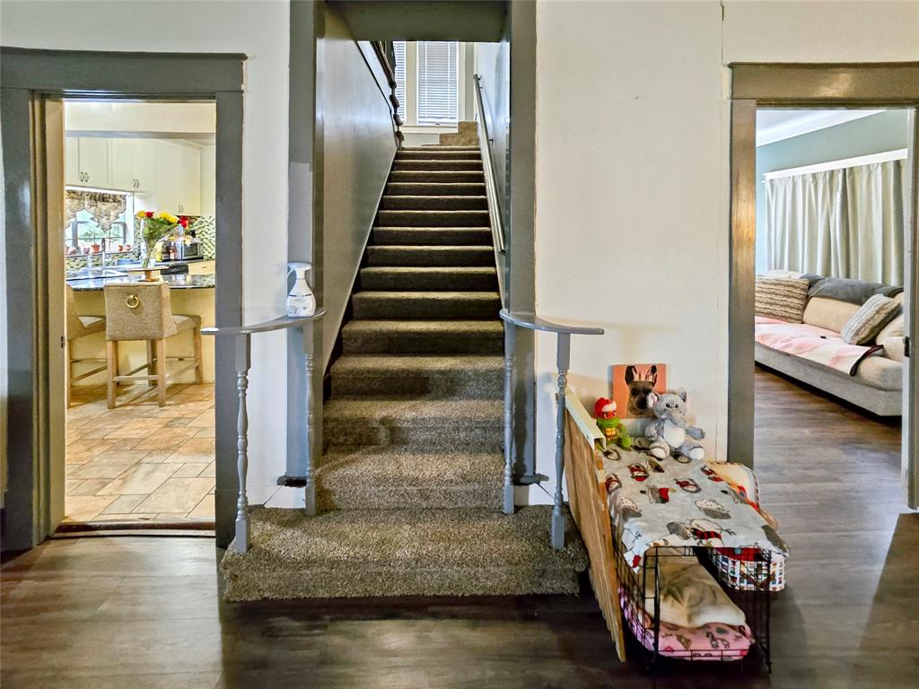 502 Griffith Avenue Terrell, TX 75160 - Photo 7 of 25 a view of entryway and hall with wooden floor