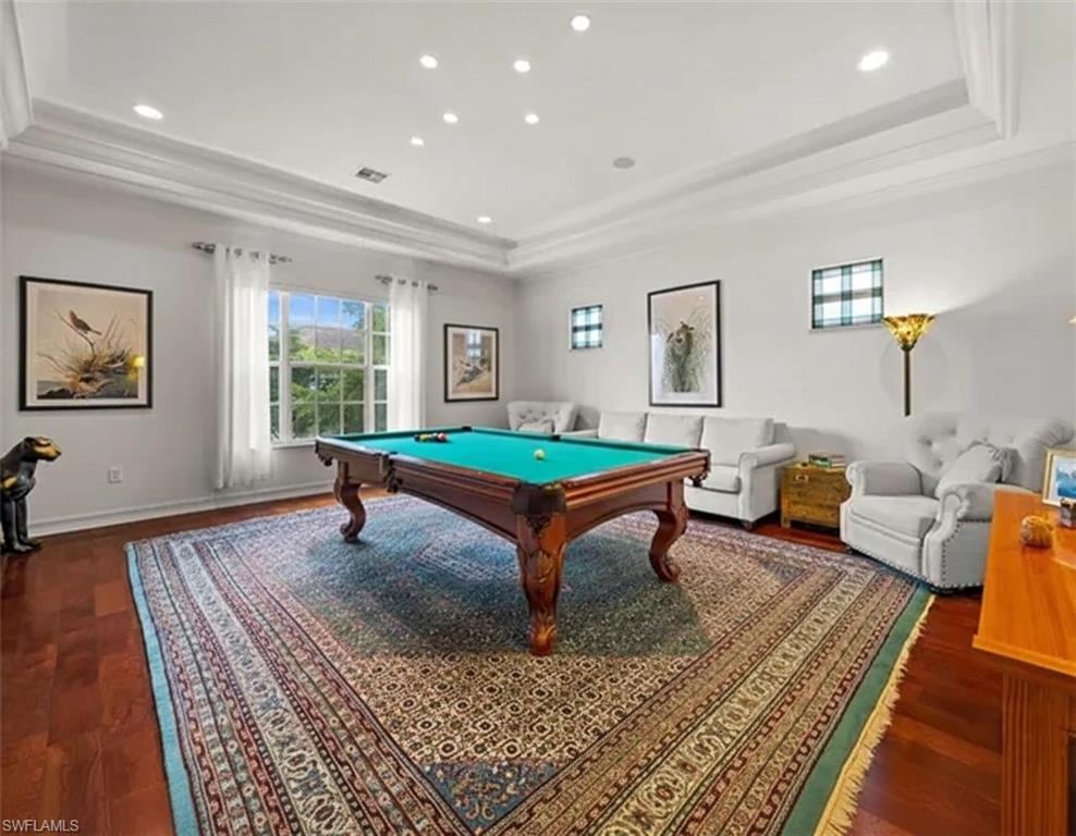 5045 Blauvelt Way, Unit 201 Naples, FL 34105 - Photo 20 of 39 a living room with furniture and a rug