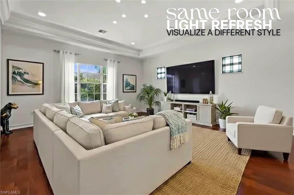 5045 Blauvelt Way, Unit 201 Naples, FL 34105 - Photo 21 of 39 a living room with furniture and a flat screen tv