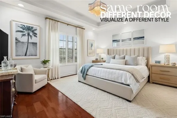 a bedroom with a large bed and a couch