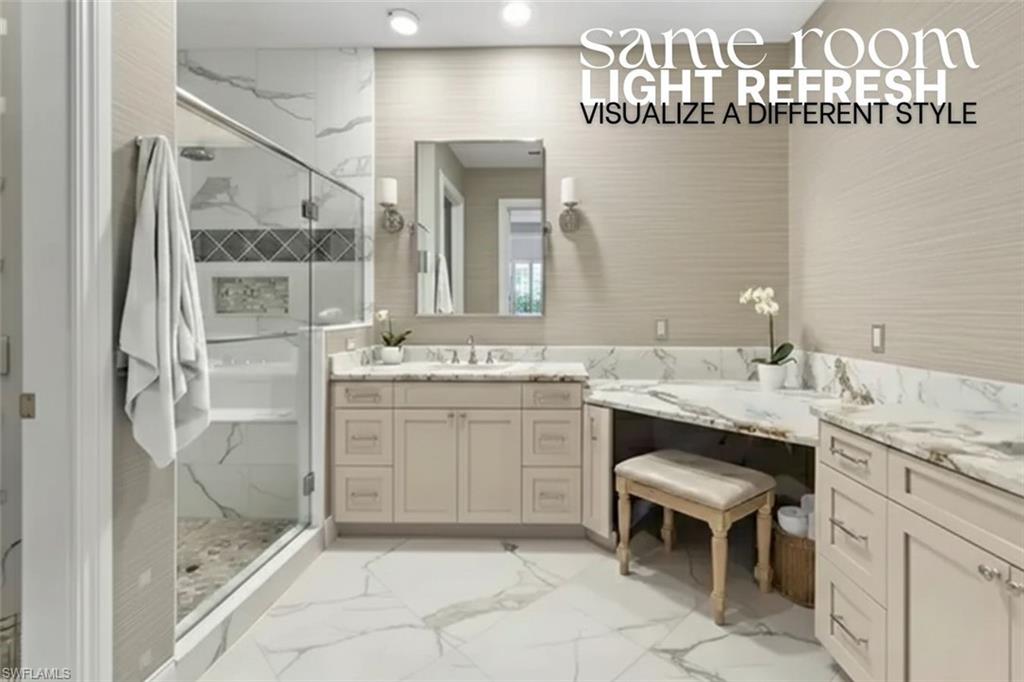 5045 Blauvelt Way, Unit 201 Naples, FL 34105 - Photo 25 of 39 a spacious bathroom with a granite countertop sink a mirror and a shower