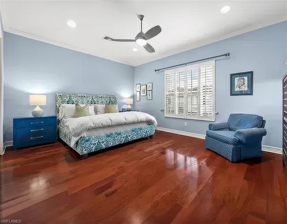 5045 Blauvelt Way, Unit 201 Naples, FL 34105 - Photo 28 of 39 a bedroom with a bed couch and window