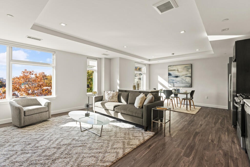 30 Collins Avenue Saugus, MA 01906 - Photo 13 of 35 a living room with furniture and a wooden floor