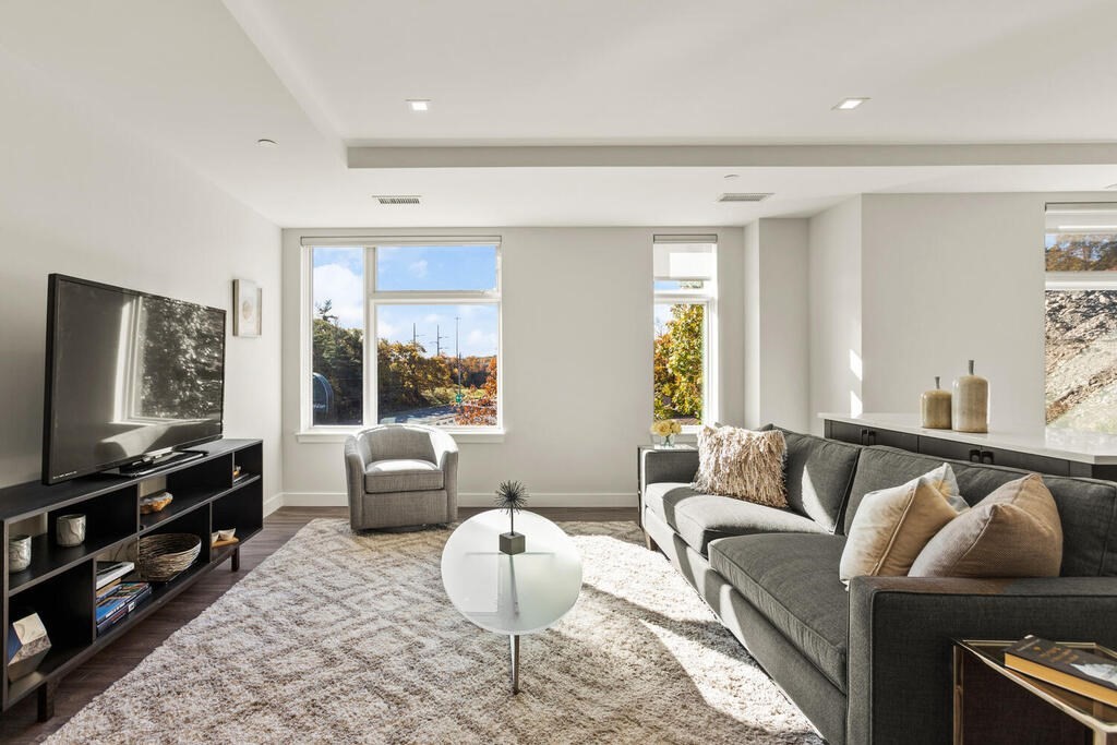 30 Collins Avenue Saugus, MA 01906 - Photo 14 of 35 a living room with furniture and a flat screen tv