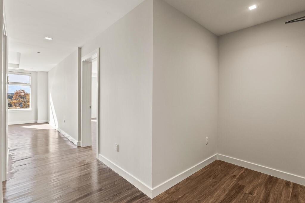 30 Collins Avenue Saugus, MA 01906 - Photo 21 of 35 a view of an empty room with wooden floor