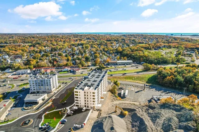 a view of a city with tall buildings