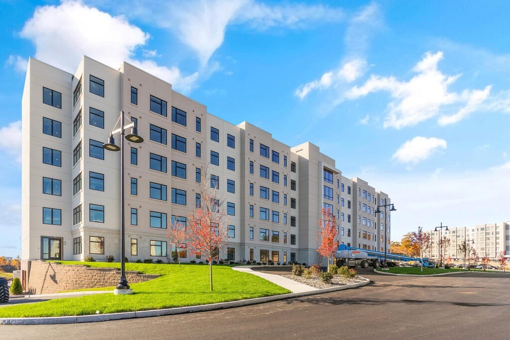 30 Collins Avenue Saugus, MA 01906 - Photo 6 of 35 a view of a building with a yard