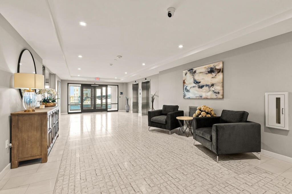 30 Collins Avenue Saugus, MA 01906 - Photo 8 of 35 a living room with furniture and kitchen view