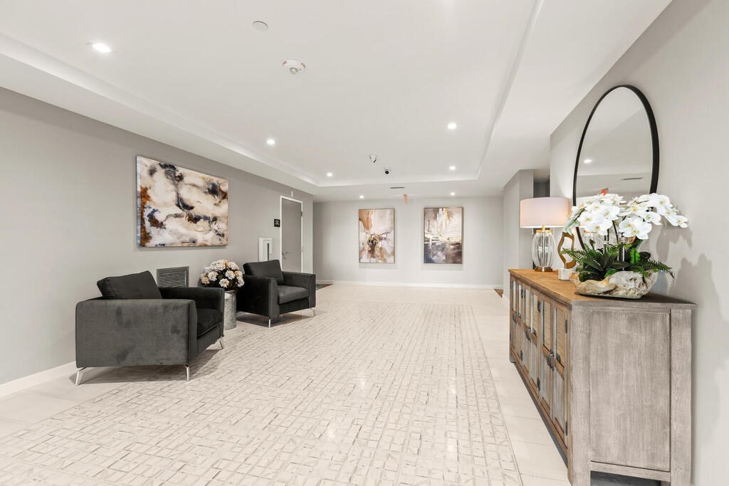 30 Collins Avenue Saugus, MA 01906 - Photo 9 of 35 a living room with furniture and flowers