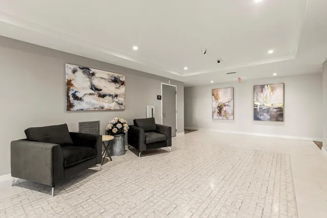 a view of a hall with the refrigerator