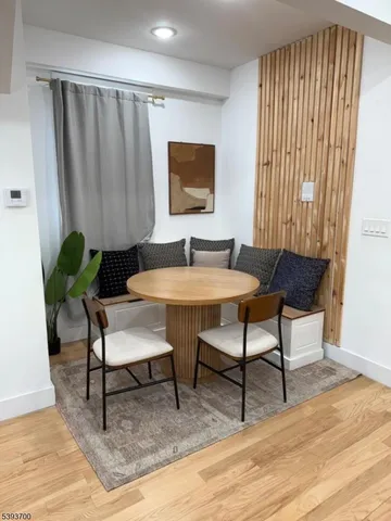 a workspace with furniture and a window