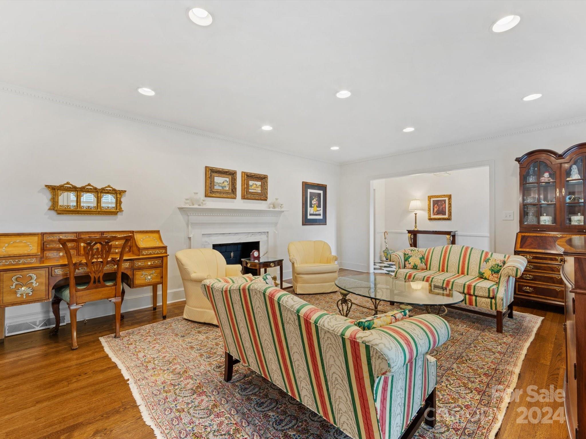 4233 Columbine Circle Charlotte, NC 28211 - Photo 11 of 47 a living room with furniture fireplace and rug