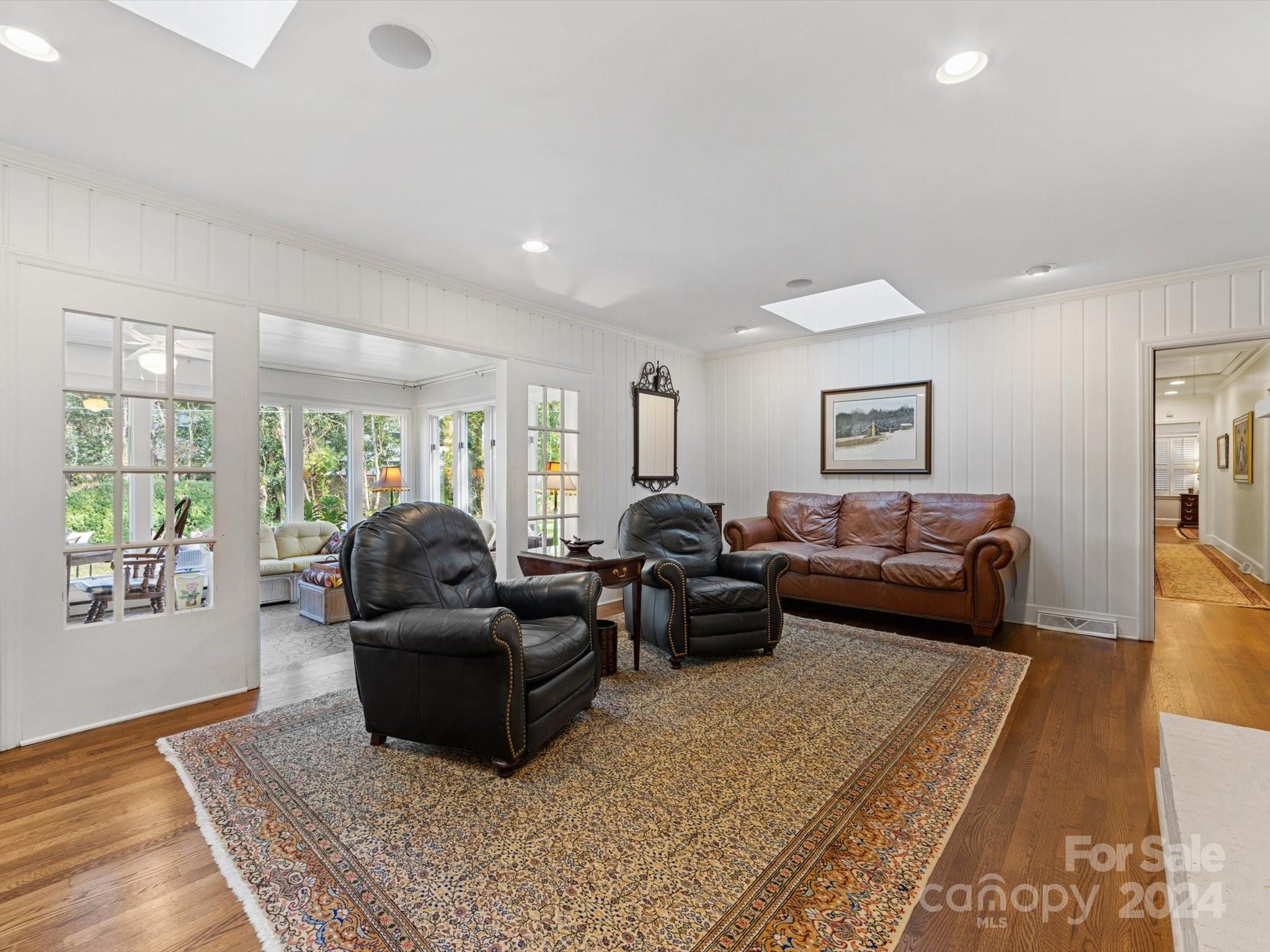 4233 Columbine Circle Charlotte, NC 28211 - Photo 16 of 47 a living room with furniture rug and wooden floor