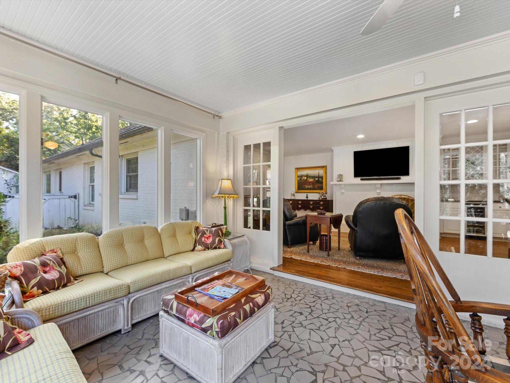 4233 Columbine Circle Charlotte, NC 28211 - Photo 20 of 47 a living room with furniture a flat screen tv and a rug