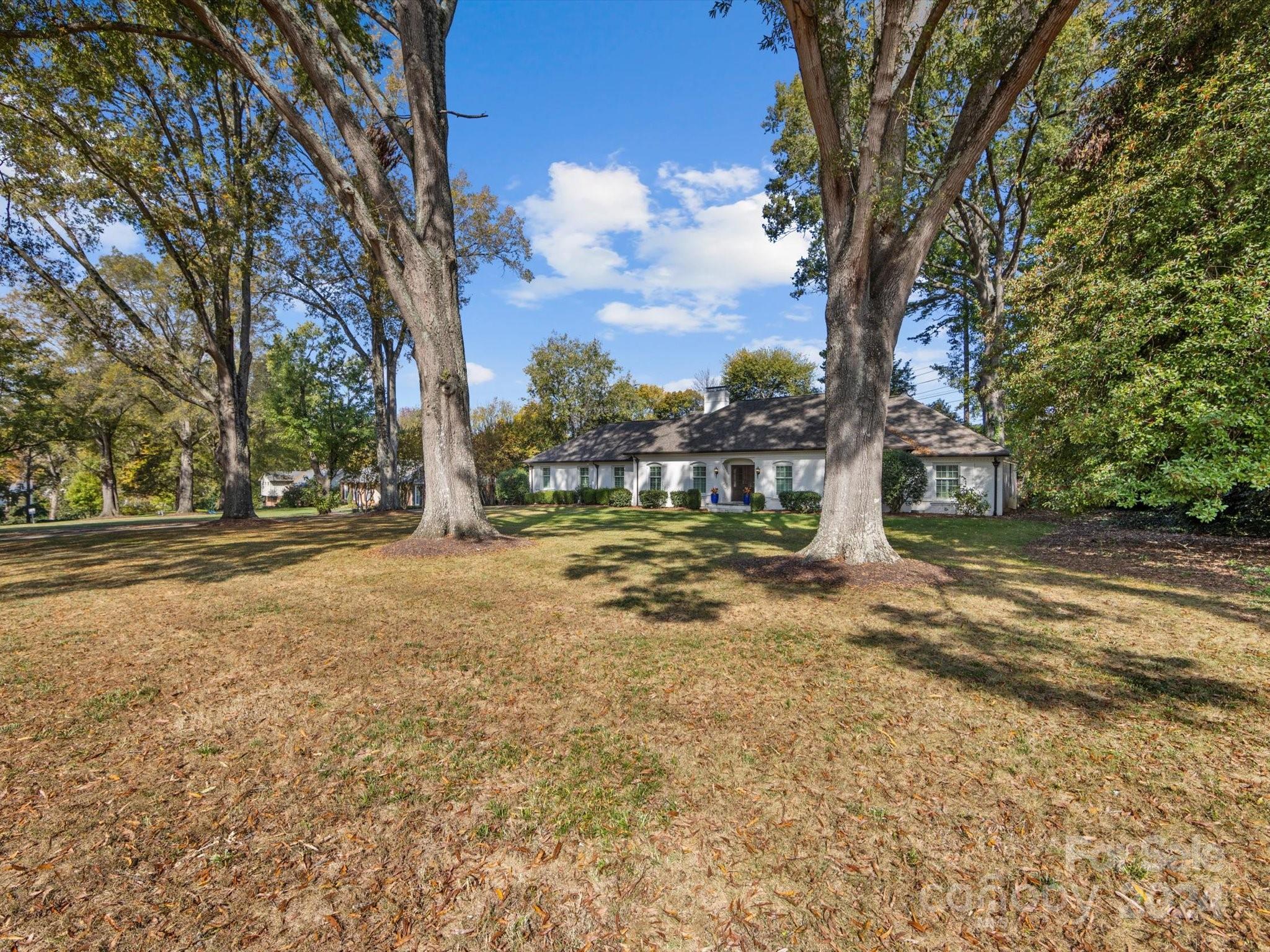 4233 Columbine Circle Charlotte, NC 28211 - Photo 2 of 47 a view of a yard with a tree