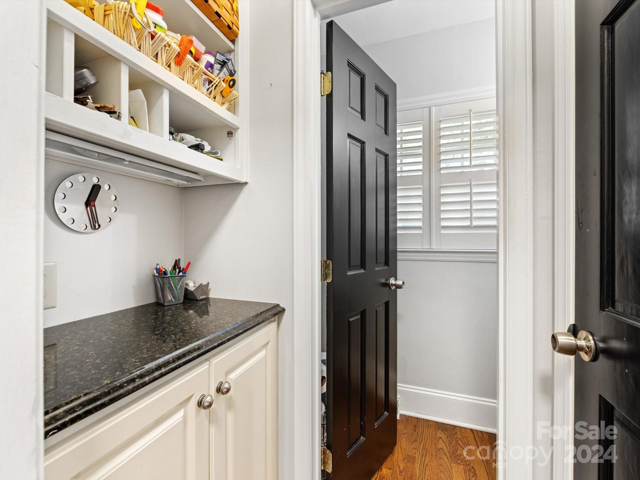 4233 Columbine Circle Charlotte, NC 28211 - Photo 28 of 47 a close view of a kitchen sink and cabinets