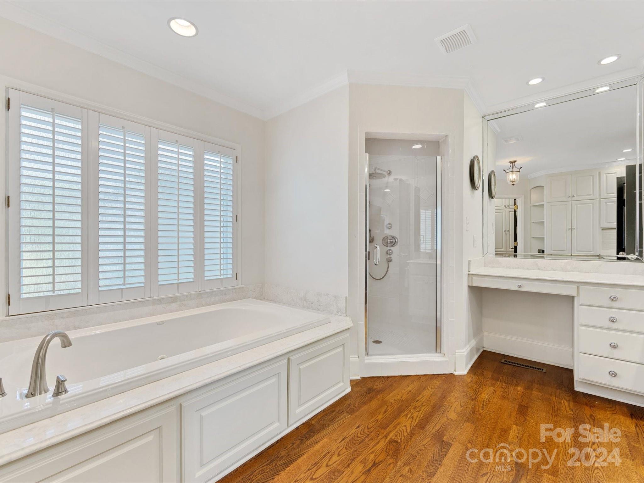 4233 Columbine Circle Charlotte, NC 28211 - Photo 34 of 47 a bathroom with a bathtub and a sink