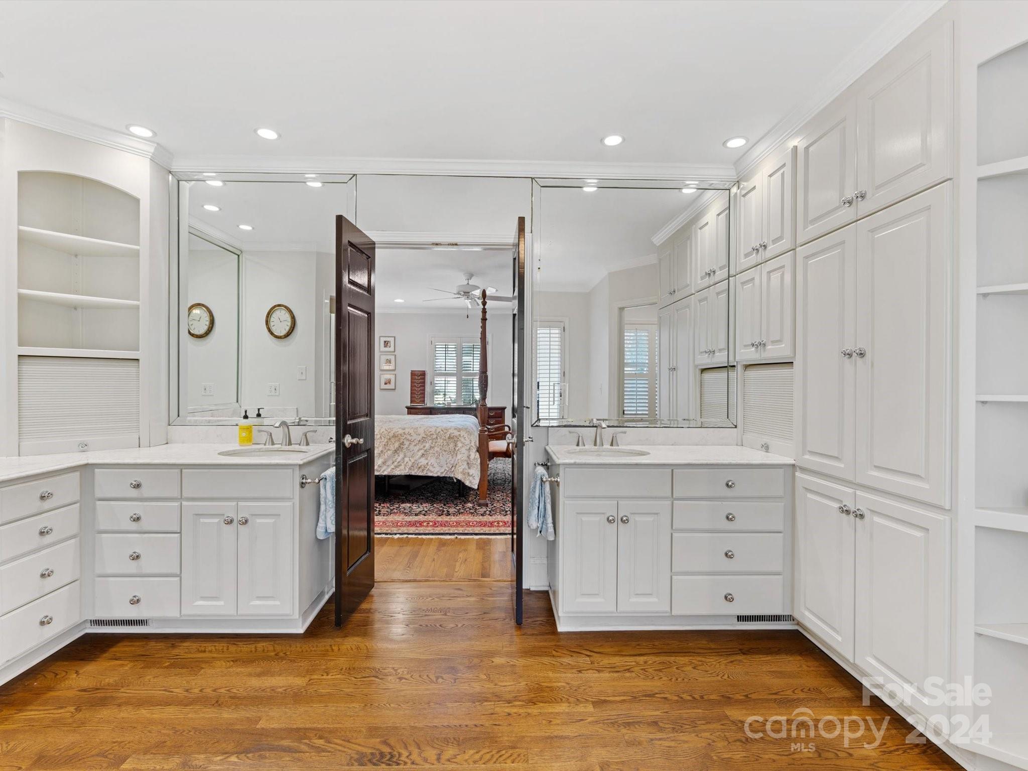 4233 Columbine Circle Charlotte, NC 28211 - Photo 35 of 47 a spacious bathroom with a granite countertop sink and a mirror
