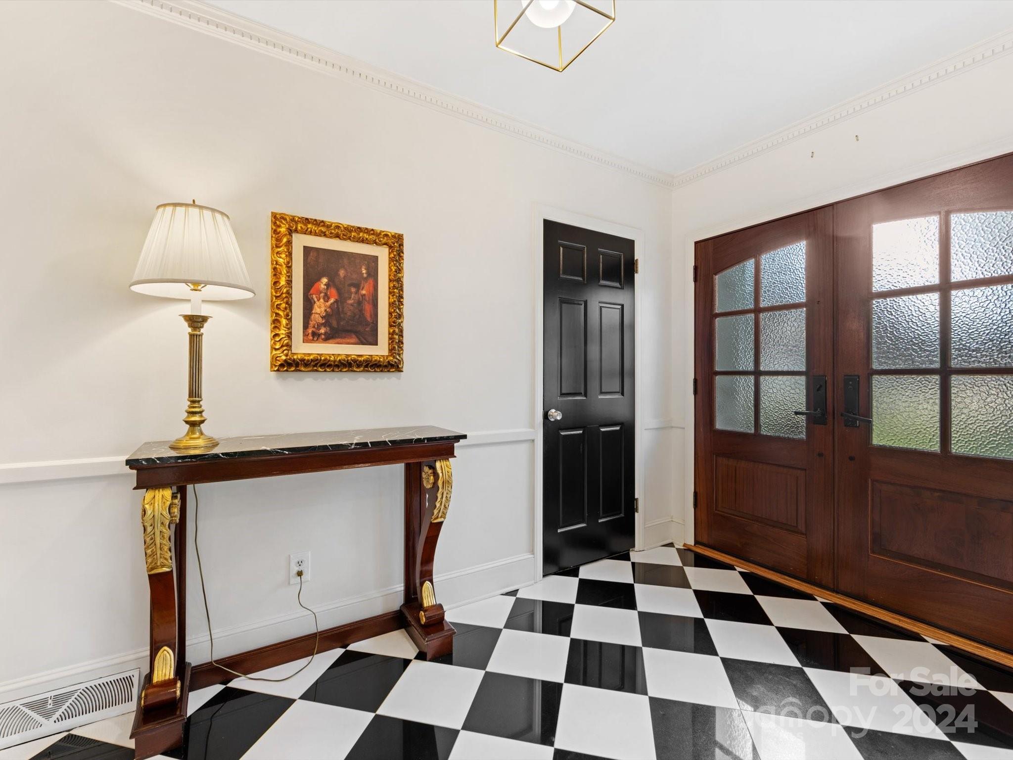 4233 Columbine Circle Charlotte, NC 28211 - Photo 4 of 47 a black and white checkered floor with a black white checkered floor