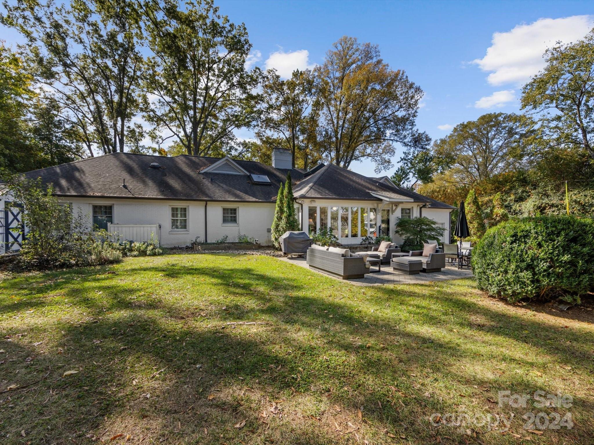 4233 Columbine Circle Charlotte, NC 28211 - Photo 42 of 47 a view of a house with swimming pool and sitting area