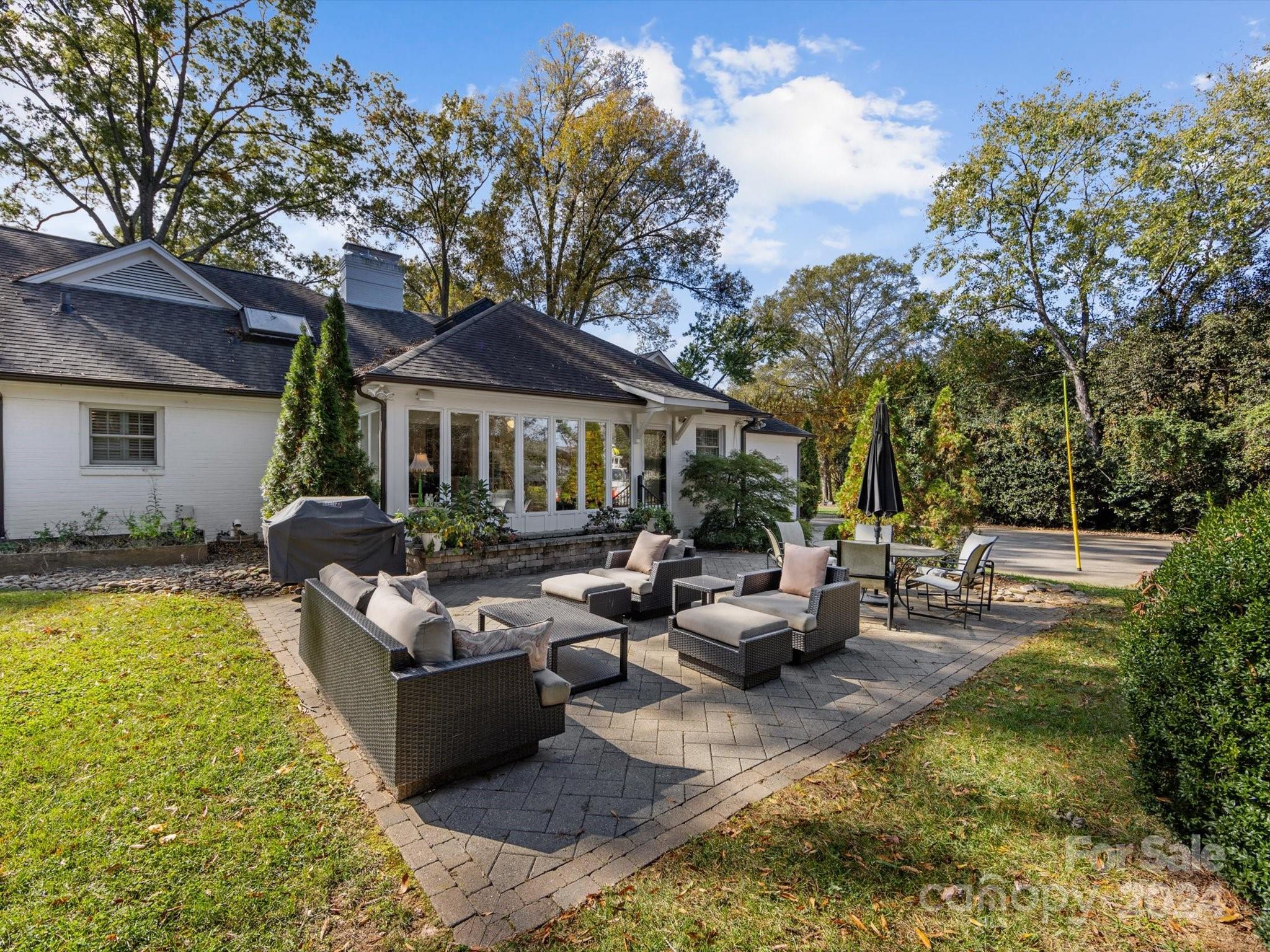 4233 Columbine Circle Charlotte, NC 28211 - Photo 43 of 47 a view of a house with swimming pool and sitting area