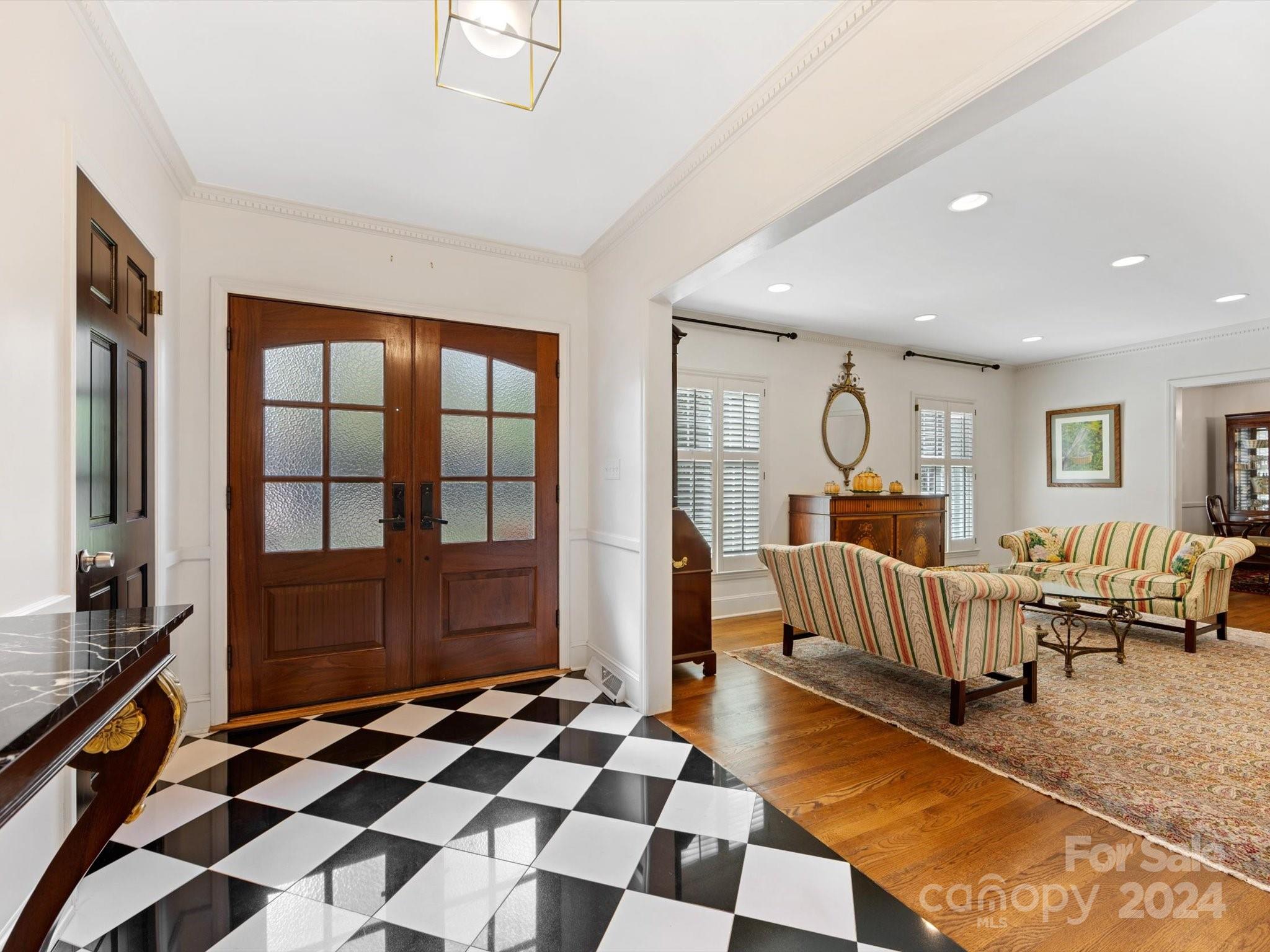4233 Columbine Circle Charlotte, NC 28211 - Photo 5 of 47 a living room with furniture and a rug