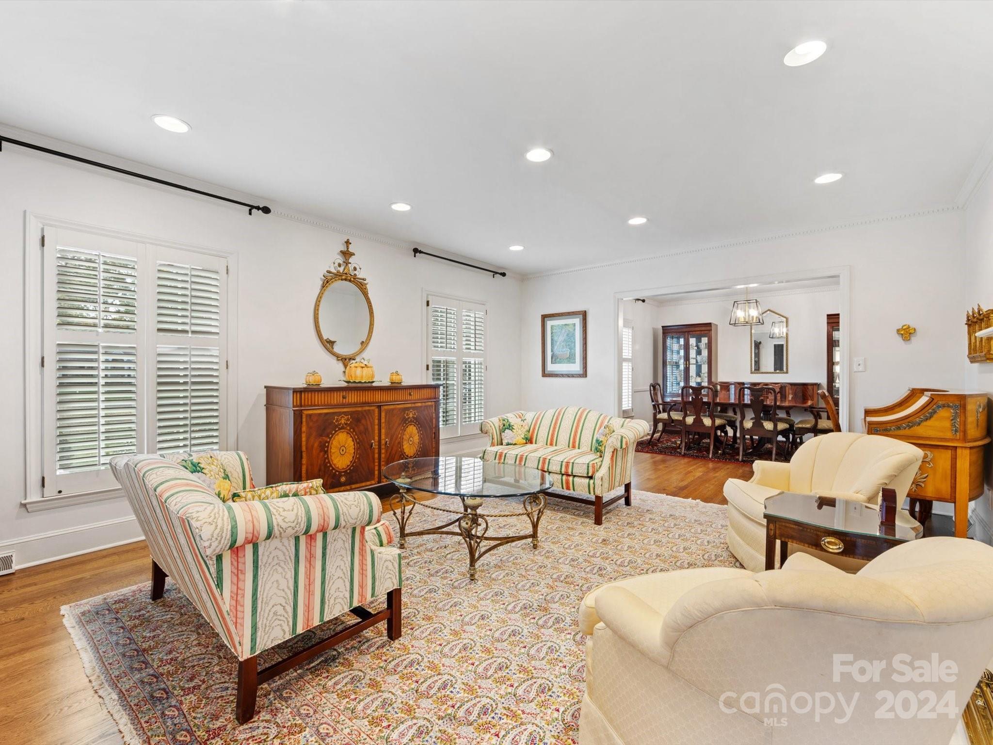 4233 Columbine Circle Charlotte, NC 28211 - Photo 9 of 47 a living room with furniture and a large window