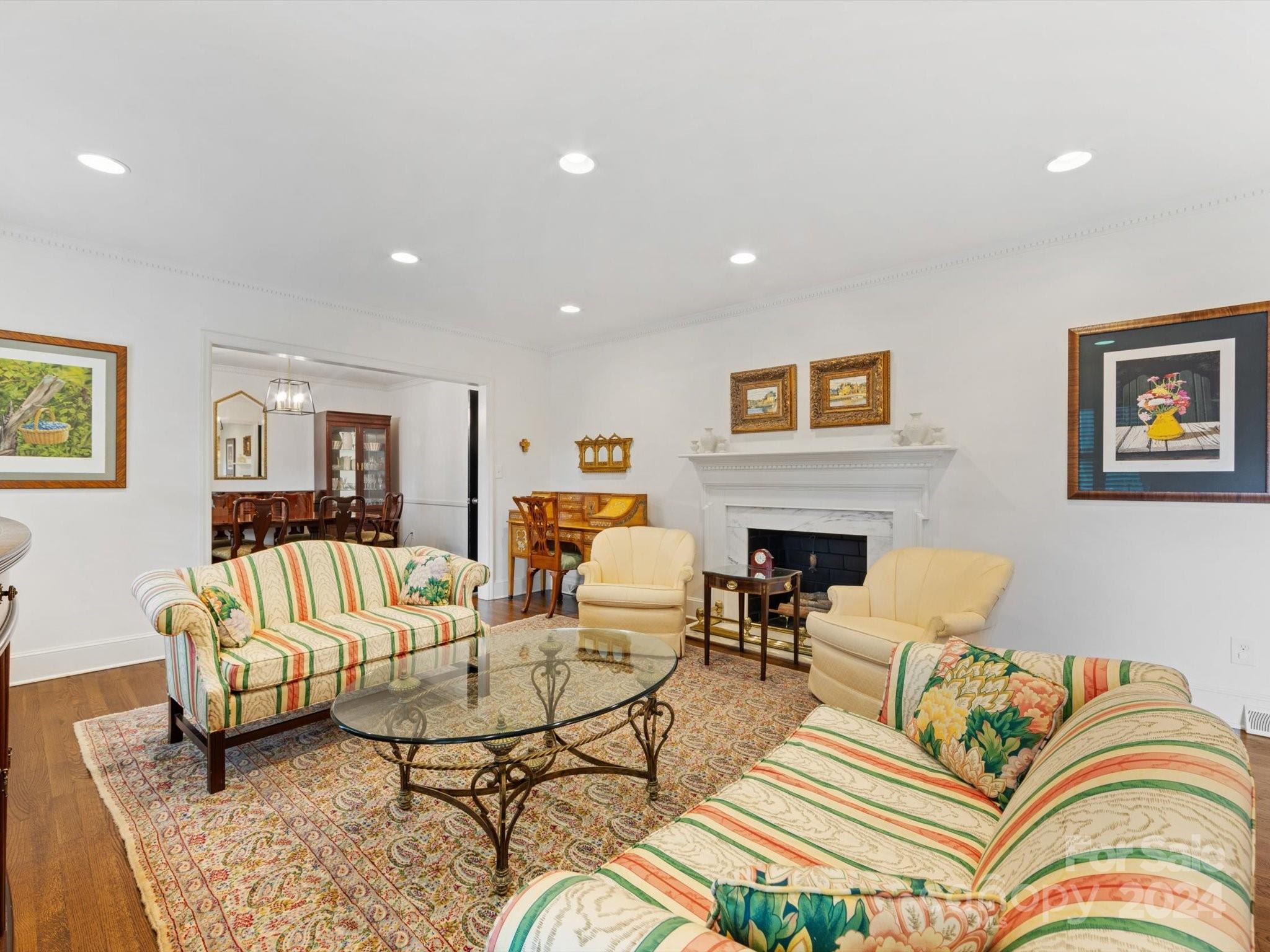 4233 Columbine Circle Charlotte, NC 28211 - Photo 10 of 47 a living room with fireplace furniture and a couch