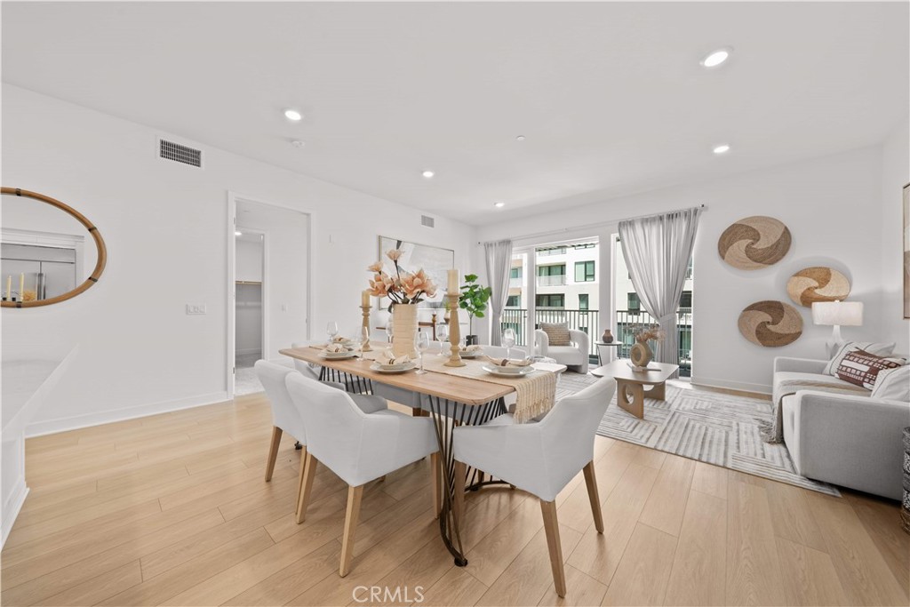 2510 Rivington Irvine, CA 92612 - Photo 15 of 41 a view of a dining room with furniture and a chandelier