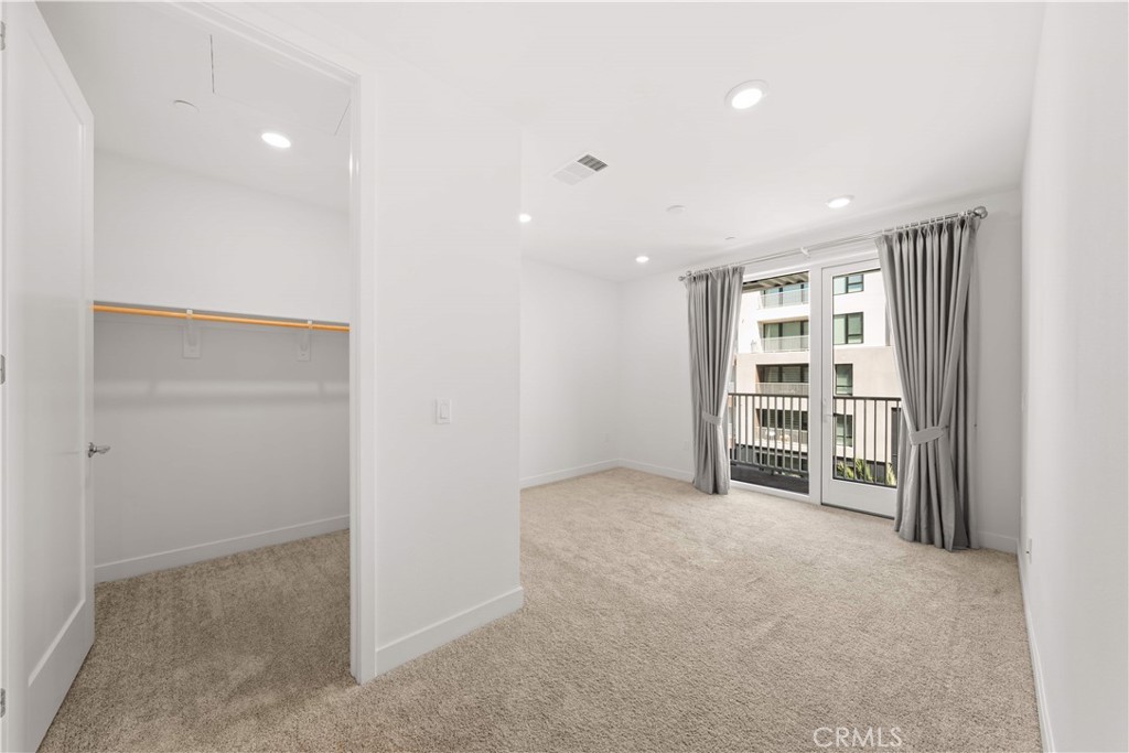 2510 Rivington Irvine, CA 92612 - Photo 18 of 41 an empty room with a window and closet