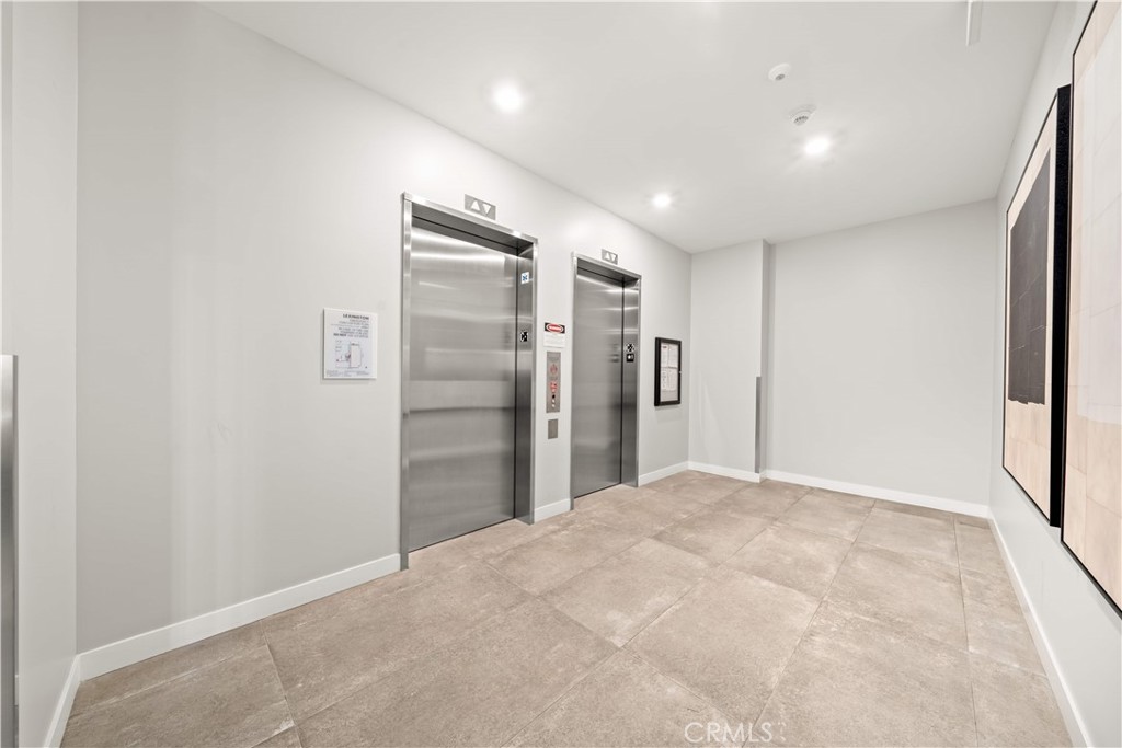 2510 Rivington Irvine, CA 92612 - Photo 2 of 41 a view of a hallway with a refrigerator