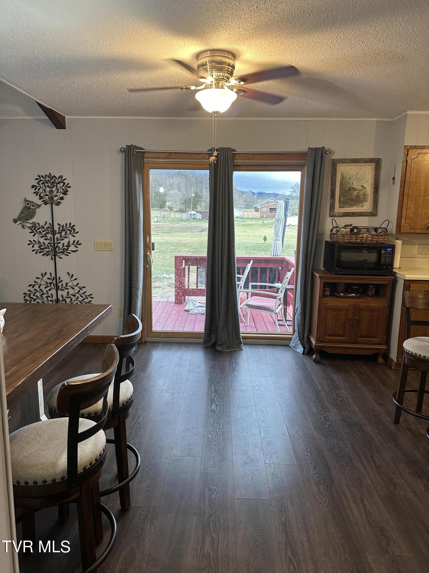 109 Teresa Moore Road Chuckey, TN 37641 - Photo 12 of 24 Dining with back deck view