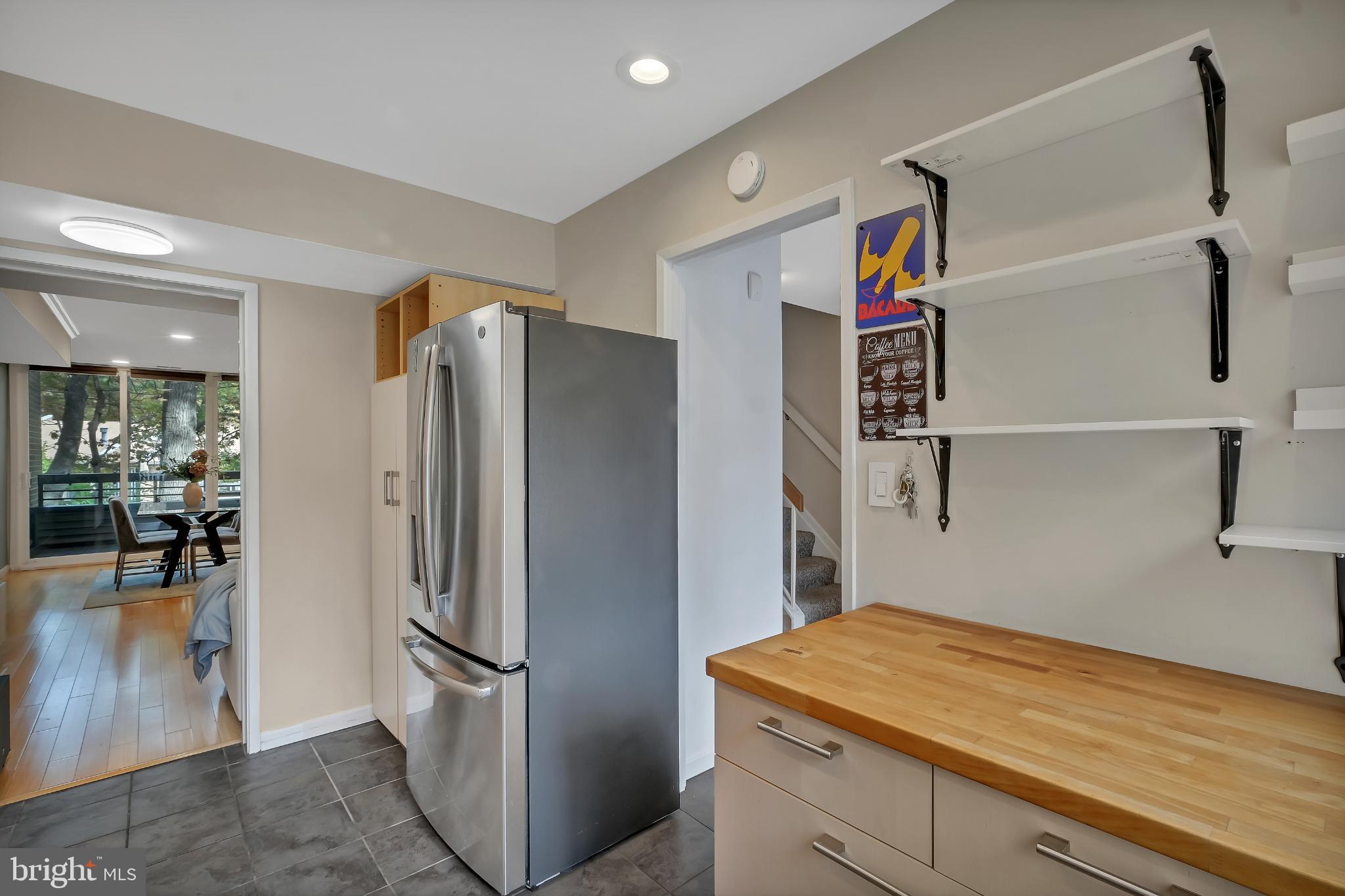 11604 Ivystone Court, Unit 6 Reston, VA 20191 - Photo 11 of 36 a kitchen with a refrigerator and countertop
