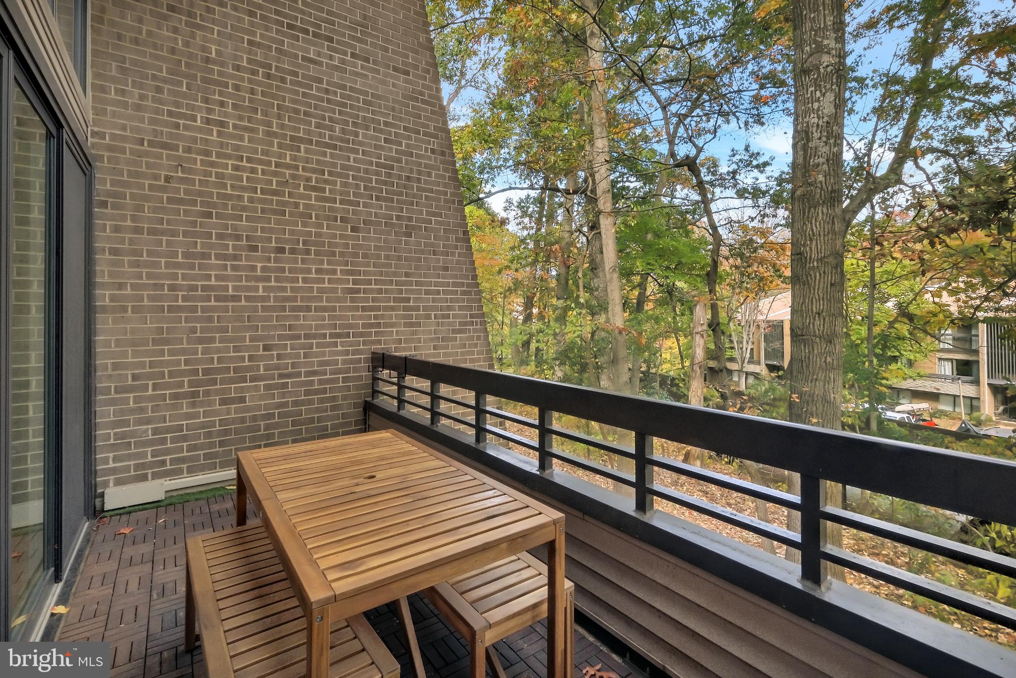 11604 Ivystone Court, Unit 6 Reston, VA 20191 - Photo 4 of 36 a view of balcony with wooden floor and fence
