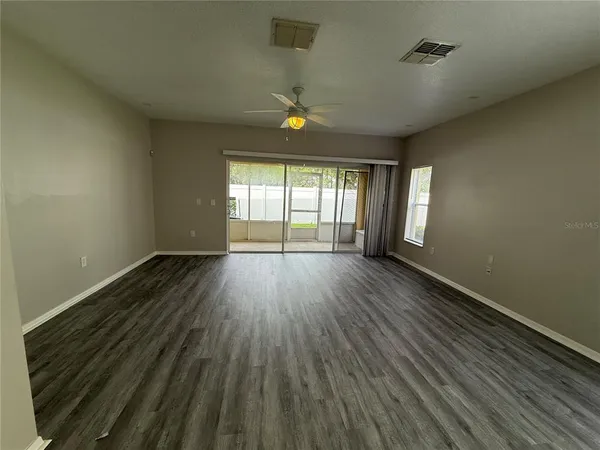 a view of an empty room and window
