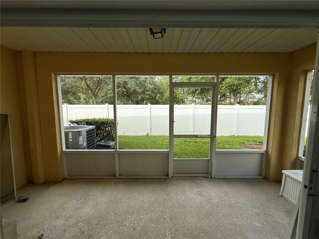 20460 Needletree Drive Tampa, FL 33647 - Photo 13 of 28 a view of an empty room with a large window