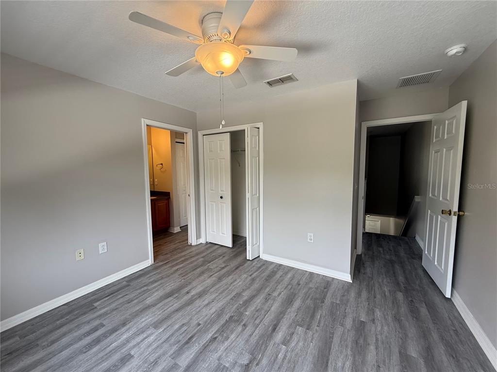 20460 Needletree Drive Tampa, FL 33647 - Photo 17 of 28 wooden floor in an empty room with a window