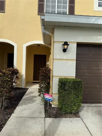 a view of house with outdoor space