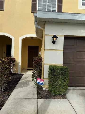 a view of house with outdoor space