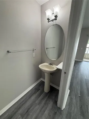 a bathroom with a toilet and a sink