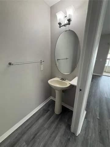 a bathroom with a toilet and a sink