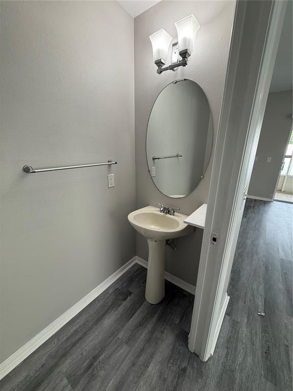 20460 Needletree Drive Tampa, FL 33647 - Photo 9 of 28 a bathroom with a sink toilet and mirror