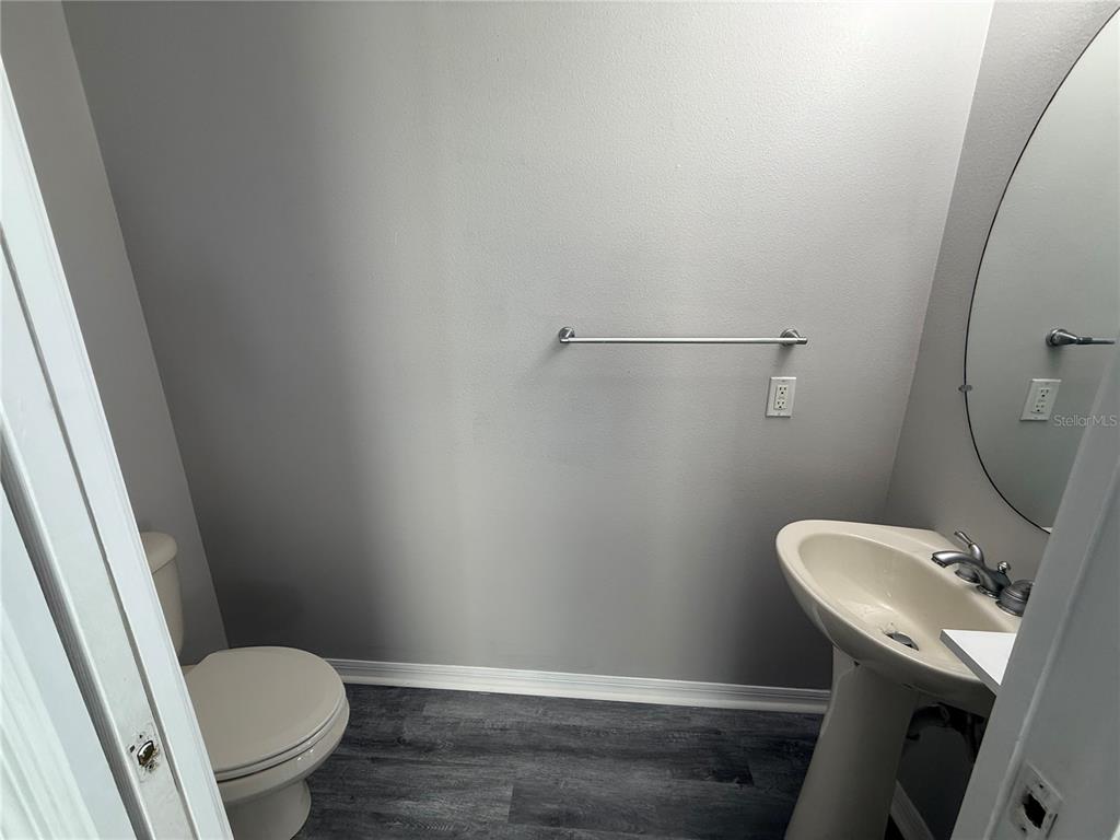 20460 Needletree Drive Tampa, FL 33647 - Photo 10 of 28 a bathroom with a toilet and a sink