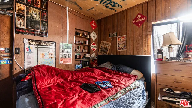 a view of a patio with table and chairs