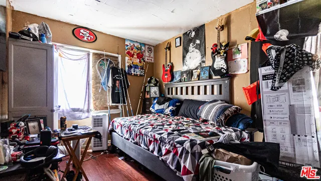 a bathroom with a sink toilet and a mirror