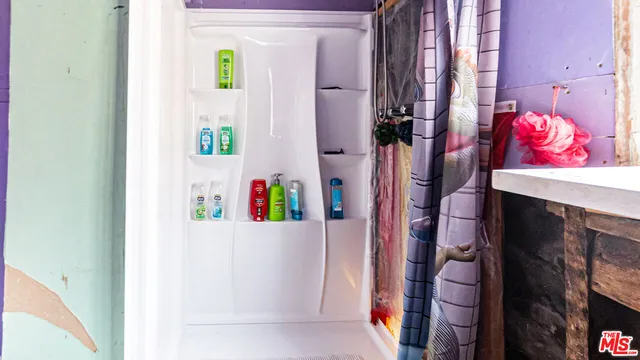a view of a chairs and table in a patio