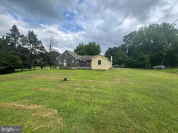 a view of a house with a park