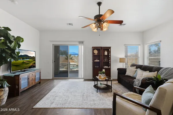 a kitchen with sink stove and cabinets